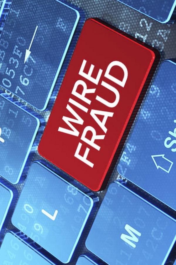 wire fraud on a computer keyboard